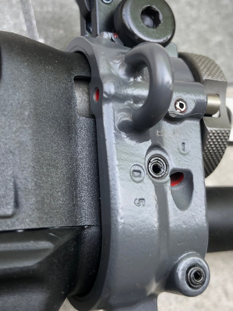jjreeves's tweet photo. Buyer beware. Sig 55X series rifles are hard to come by right now. Sig Sauer AG made a "730th Anniversary Edition" 551 in bright red with laser engraving. While this style of commemorative rifle appeals to some European consumers, it's less desirable in the US market.
I had a potential client reach out to me a couple of weeks ago to tell me that he purchased one of these guns...without knowing it. Apparently, someone has re-coated these rifles in traditional Sig gray and is re-selling them without disclosing their origin as anniversary guns. I have an idea of who is doing it, but I am not going to make accusations publicly, especially since the issue was resolved for the possible client after I advised him on a course of action. But the client did tell me that I could disclose the circumstances of this incident so others might avoid what he encountered.
From pictures on the internet, it's hard to tell a re-coated red gun from the standard gun. However, there are unmistakable cues when the rifle is in hand. Namely, the laser engraving is still visible through the gray coating, and there are still traces of red in areas too small for the coating to reach. See attached pictures. My understanding is that these guns are serialized JDI 730-XXX.
I'm not telling you to NOT buy these guns. After all, Sig 5X series are some of the greatest in the world. If you don't mind raised areas in the coating or flecks of red in hard-to-see nooks and crannies, great. I just want consumers to know what they are buying when they buy it. And it's disappointing that a company or person in the gun industry would conceal the origin of these rifles from other gun enthusiasts to maximize profit. BOLO.