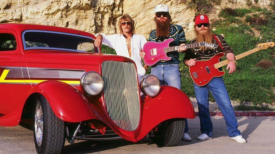 crockpics's tweet photo. ZZ Top hanging out on the California coast with the iconic Eliminator coupe in 1983. 
Photographer Robert Alford caught this shot as the band was transitioning into MTV royalty. Their Eliminator album had just dropped that March. To help push the new sound, Billy Gibbons had this custom 1933 Ford coupe built, and it instantly became the ultimate symbol of the band. Within a few months, this car and these exact looks would be all over television screens everywhere.

Who out there remembers when these videos first started taking over MTV back in '83? What is your favorite track from the Eliminator record? Let’s hear your memories in the comments! 👇