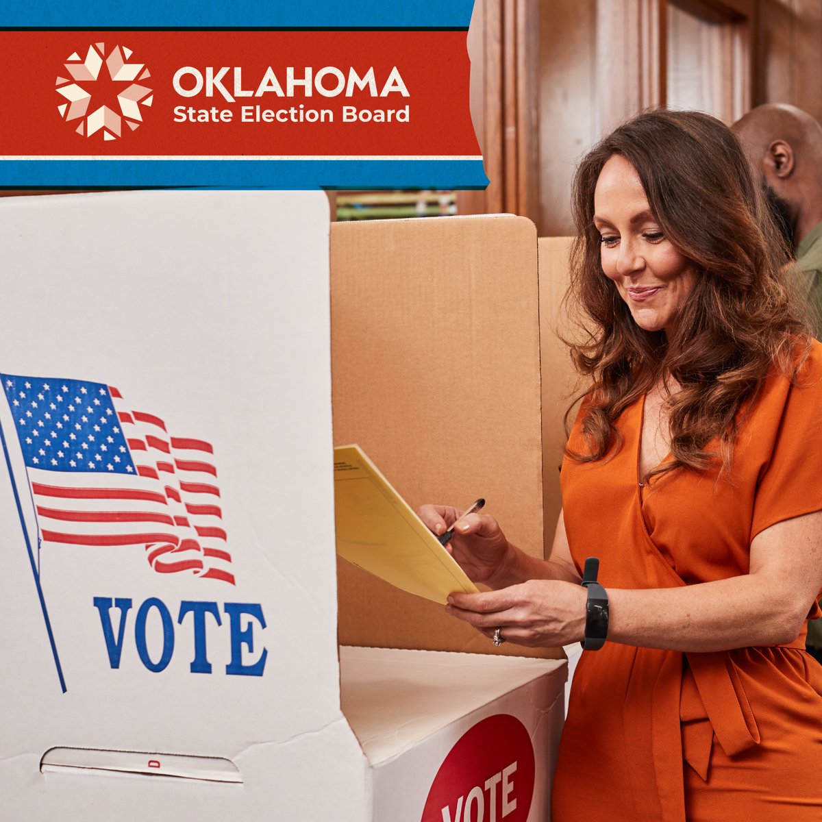 Photograph of a woman smiling while walking to a voting booth carrying a ballot. The Oklahoma State Election Board logo is shown across the top left-hand corner of the image.