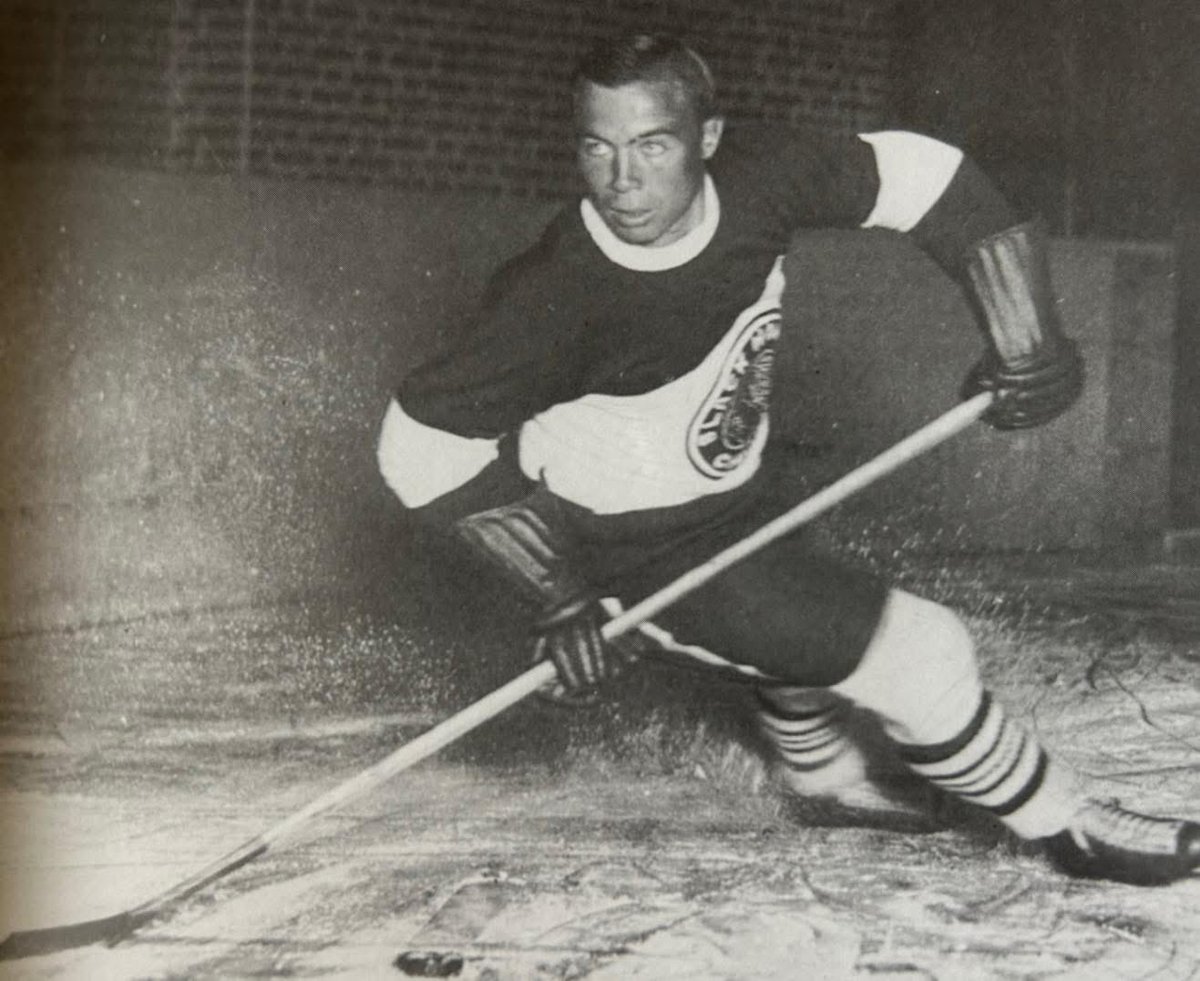 Sulli26's tweet photo. Mush March wearing the 34-35 #Blackhawks jersey.  Have never seen an original #gameworn jersey of this one-year style ever pop up. It’s all black &amp; white, the next year red was introduced like the jerseys the Hawks wore at the 2009 Winter Classic. https://t.co/WVKFEKVCfh