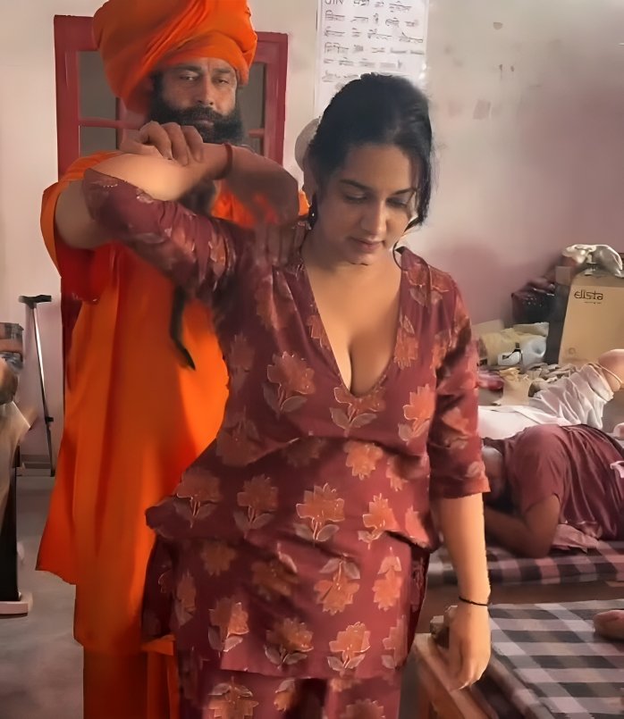 upasanahu's tweet photo. Orange robe doing what her man in the corner never could. One hand on neck, other on soul… and probably her soul’s Ji-spot" https://t.co/KTI03ksCaE