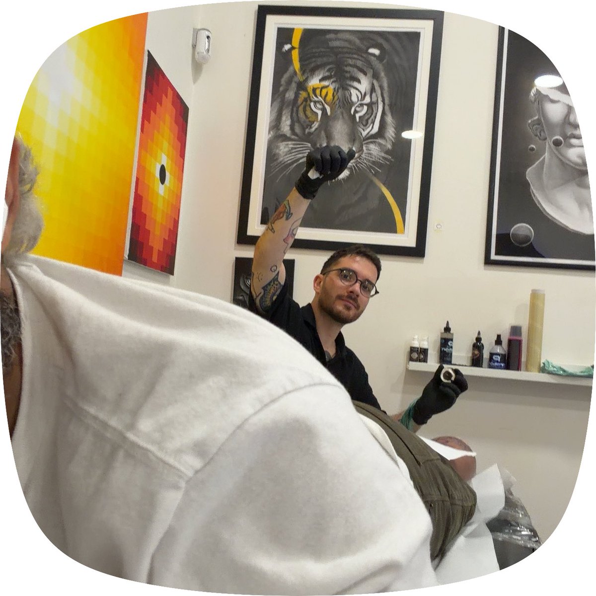 404vish's tweet photo. discussing our upcoming model distillation run with team while getting inked. @MisoLabsAI mind if we chat about distillation? https://t.co/mvOWxglzYa