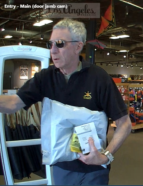 conlin_lauren's tweet photo. BREAKING: This is the last known and verified image of retired Air Force Major General Neil McCasland, captured the day before he vanished (photo taken Thursday, February 26, 2026).

The Bernalillo County Sheriff's Office provided me with this photo after part of my FOIA request was finally fulfilled. 

According to the image label, it was taken from an "Entry Main (door jamb cam)" surveillance camera at what appears to be the REI store in Santa Fe, which is the nearest REI location to McCasland's Quail Run neighborhood, approximately 6 to 8 miles away. REI is an outdoor/sporting goods store. In the photo, McCasland appears calm and composed. He's carrying a large white parcel tucked under his arm, along with a smaller boxed item and a yellow slip of paper. Unfortunately, the image contains no usable metadata, and the resolution isn't strong enough to determine exactly what the items were or what any of the packaging says. He is also wearing his apple watch.

One detail that stands out: McCasland doesn't appear to be carrying a traditional REI shopping bag. However, REI does allow customers to place orders online and pick them up in-store, leaving open the possibility that what he's carrying may have been retrieved rather than purchased during that visit....I'm currently going through all of the documents and will have updates here and @lamag...