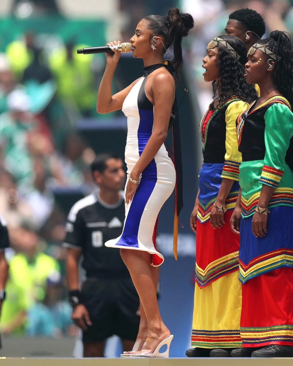 Jodyhendricks's tweet photo. Did #aquafresh design @Tyla dress for the #fifa #worldcup opening ceremony? https://t.co/LrnQzn1LGn