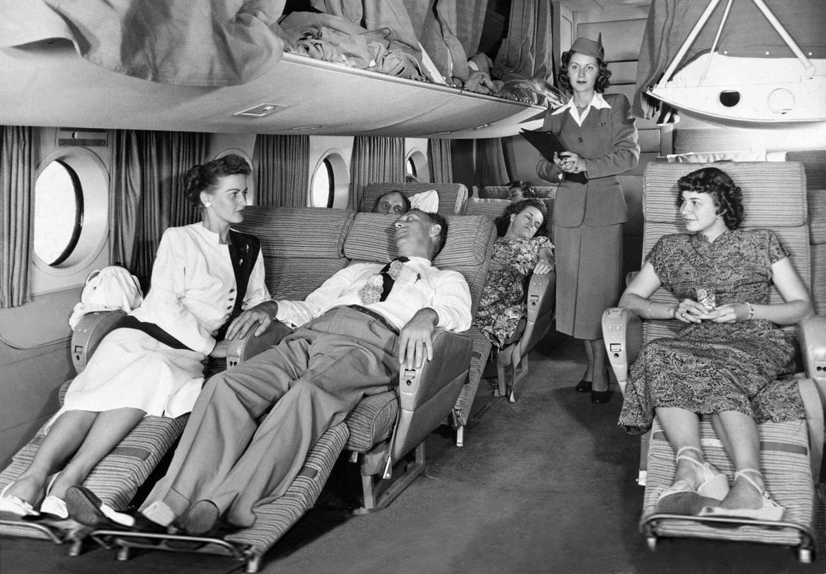 VicAlbert11's tweet photo. Pan American World Airways new Boeing B-377 'Stratocruiser', which introduced the all First Class President service across the North Atlantic in April 1949. Sleeping berths were provided, and can be seen lowered above the reclining seats. The service catered for about 60 well-heeled passengers and stopped enroute at Gander, Newfoundland for refuelling.