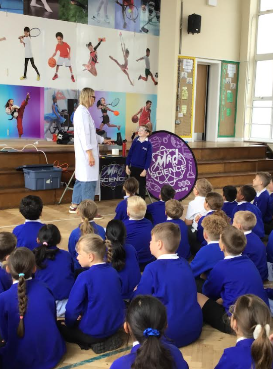 BeecroftAcademy's tweet photo. We had an unforgettable morning with Mad Science and the super scientist Atomic Aimee, diving headfirst into the invisible, powerful world of physics! Aimee demonstrated the mind-blowing experiment and hair-raising demonstration, about air resistance.  #Madscience #BestofBeecroft https://t.co/WEnxV91qQh