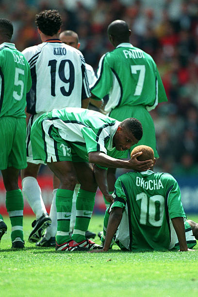 PulseNigeria247's tweet photo. Everyone backed Spain to dominate Nigeria in the 1998 WC match, but Okocha had other ideas. 🇳🇬🔥

- Controlled the game with dribbles and passes
- Embarrassed Spain's right-back until they removed  at half-time
- Sunday Oliseh scored the winner from his dangerous long throw https://t.co/WZyHFJ3GWe