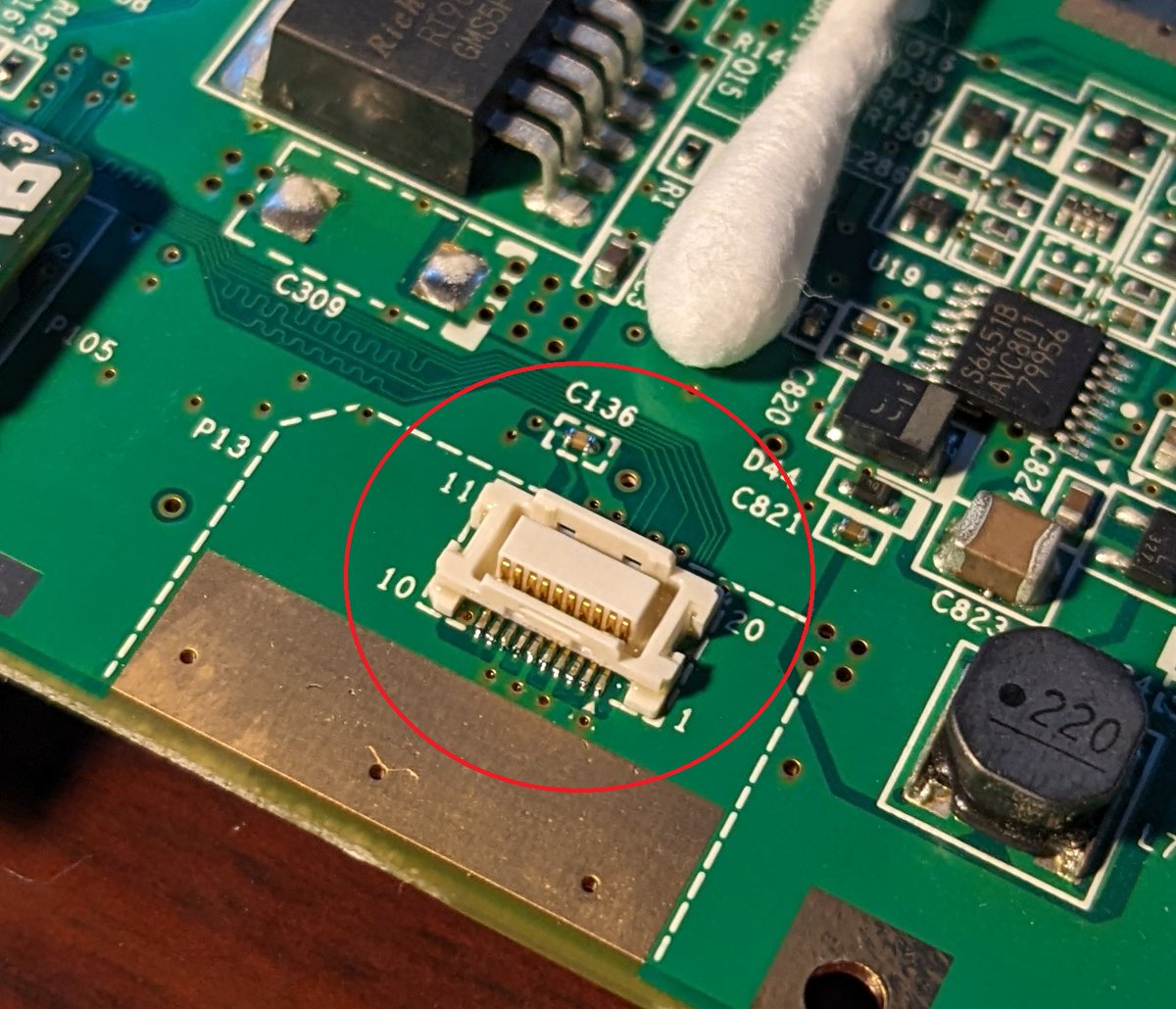 PeacefulOutcome's tweet photo. Started working on a Wii Mini yesterday.  I got the kits from @webhdx to restore the SD card and Wifi.

Holy small components!  Adding these components is definitely the smallest soldering work I've ever done.  Thankfully, I think I got it all done.

I did open the 0402 ferrite bead package a bit too aggressively... those suckers went flying and I'm positive they vaporized in the air because I couldn't find them to save my life.  Thankfully, I had a second kit and very carefully grabbed one from there (he sends 2x of the small components).