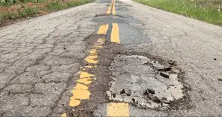 JungleBall_2's tweet photo. Remember when South Carolina hiked the gas tax in 2017 by a full 12 cents a gallon, phased in over six years, and swore up and down every extra dollar would go straight to fixing South Carolina’s crumbling roads and bridges? Yeah, that Infrastructure Maintenance Trust Fund was supposed to be the magic bullet. 
Billion$$$ collected later and our roads are still a freakin' war zone of potholes, alligator cracking, faded striping, and bridges that look like they’re auditioning for a collapse video. 
They doubled DOT spending and road conditions actually got worse. Acceptable pavement dropped while the taxman kept his hand in our pockets every time we filled up. 
Where the hell did the money go? 
More bureaucrats, more studies, more asphalt that lasts six months before it turns into Swiss cheese again? 
South Carolinians are paying premium prices at the pump for the same third-rate roads we had before the “fix.” 
Classic government bait-and-switch. 
Stop lying about “progress” and either fix the d@mn roads or give the money back.
