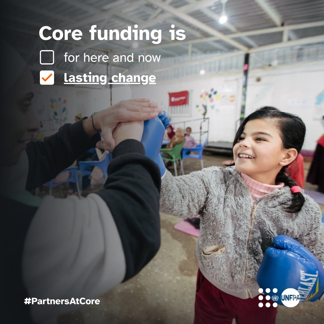 A photo of a girl wearing boxing gloves fist-bumping a woman. Text on the image reads: "Core funding is." There are two check boxes, one unchecked that reads "for here and now", one checked: "lasting change." The UNFPA logo is visible in the corner. The #PartnersAtCore logo is also displayed.