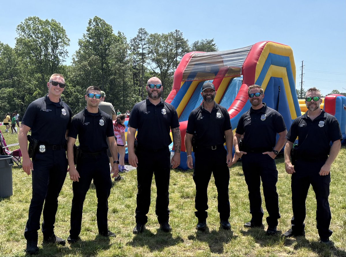 AACOPD's tweet photo. Today, Detectives from the Eastern District Strategic Patrol Team participated in the Rippling Woods Elementary School Field Day festivities. Everyone had a wonderful time, and the water activities were especially popular, helping to beat the heat. Detectives Rohe and Callahan even joined the fun by taking a turn on the water slide.