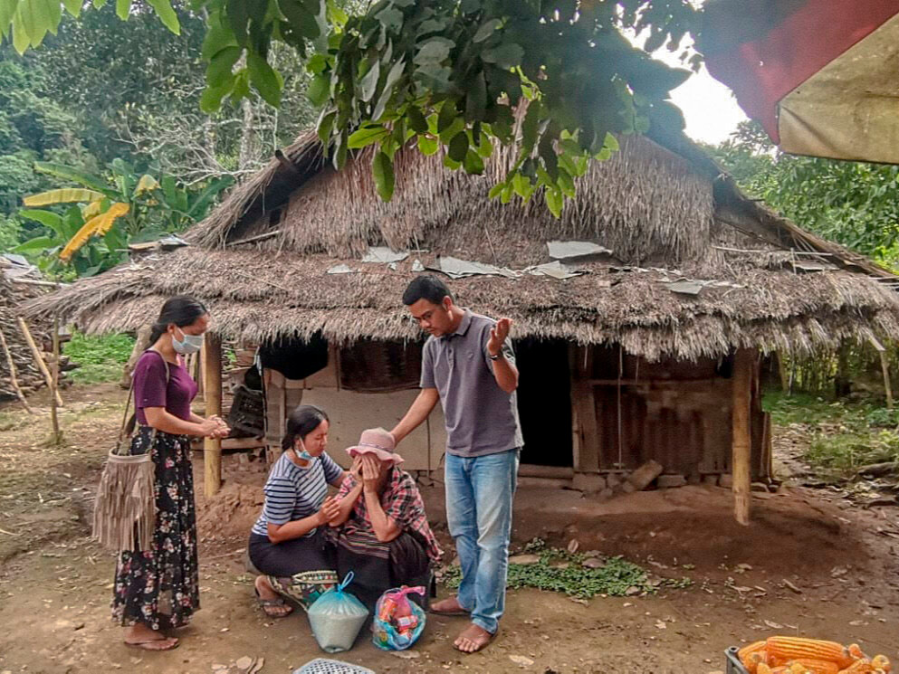 VOM_USA's tweet photo. VOM workers met with Thongkham’s wife, Sengdara, after he was killed for his Christian faith in Laos. One worker wrote: “Despite the risks, [Thongkham] knew people need to hear the gospel and encounter Christ.” https://t.co/1F2Ct5pZpg