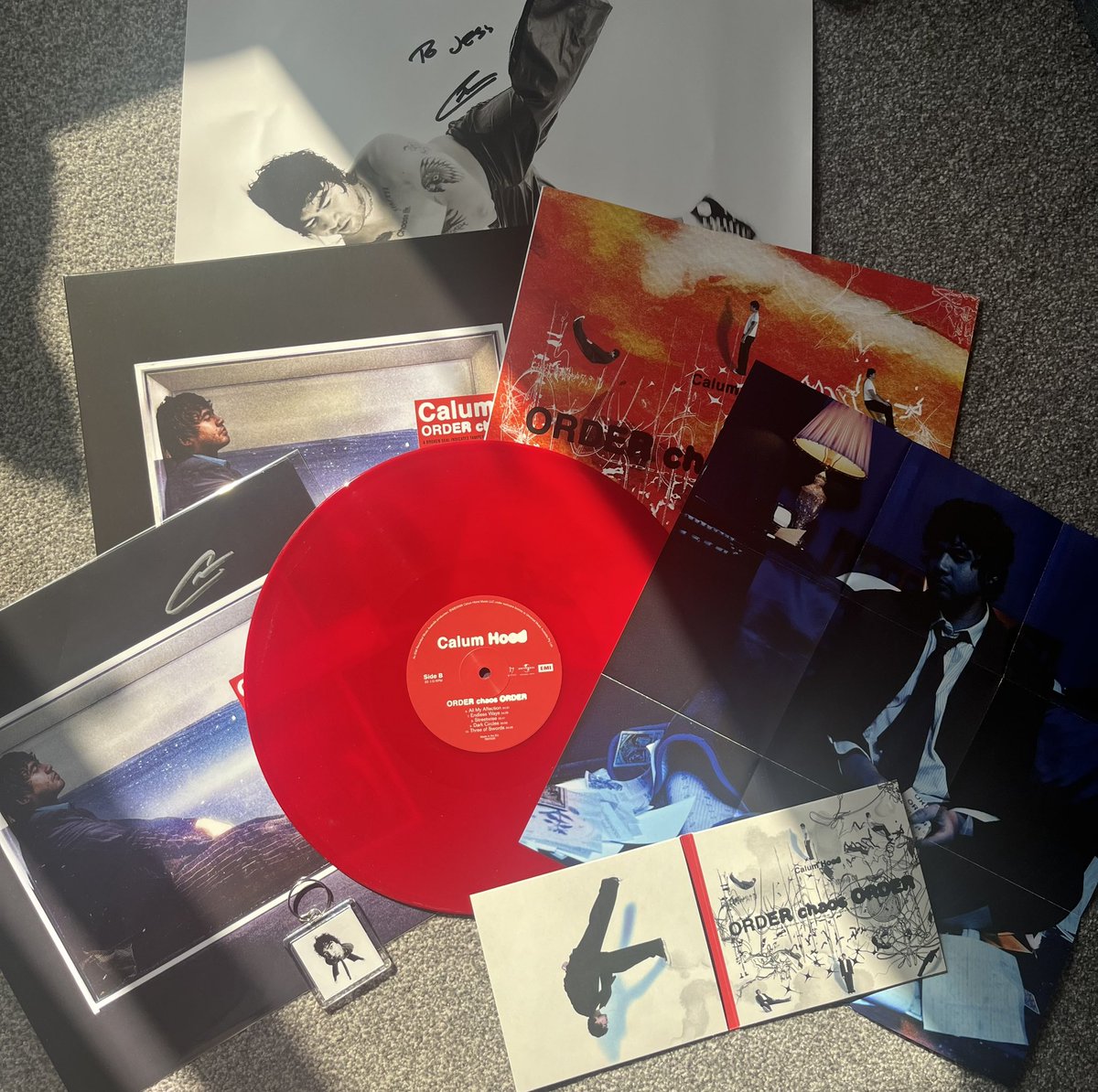 sunsetterjess's tweet photo. happy order chaos order anniversary 💙❤️ this album means the world to me and i could genuinely talk about it for days. thank you @Calum5SOS for sharing this part of your life with us. 
#ORDERchaosORDER https://t.co/XokhktWeSa