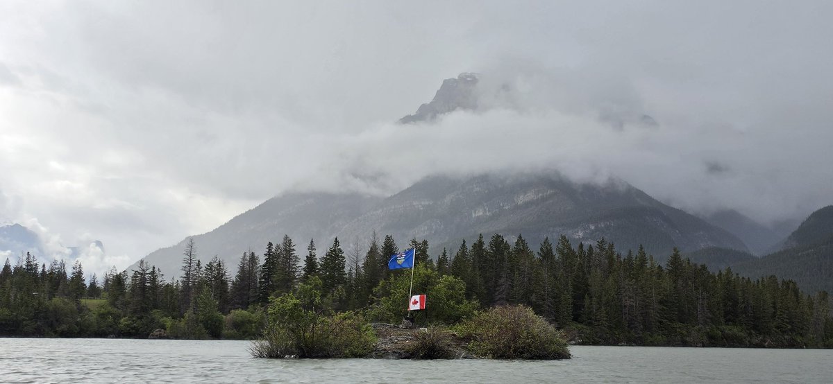 AndrewBeaucage's tweet photo. Adam's Island on Lac Des Arcs, is once again flying that sweet Alberta blue! 
#AlbertaIndependence https://t.co/SZ55dpJxYT