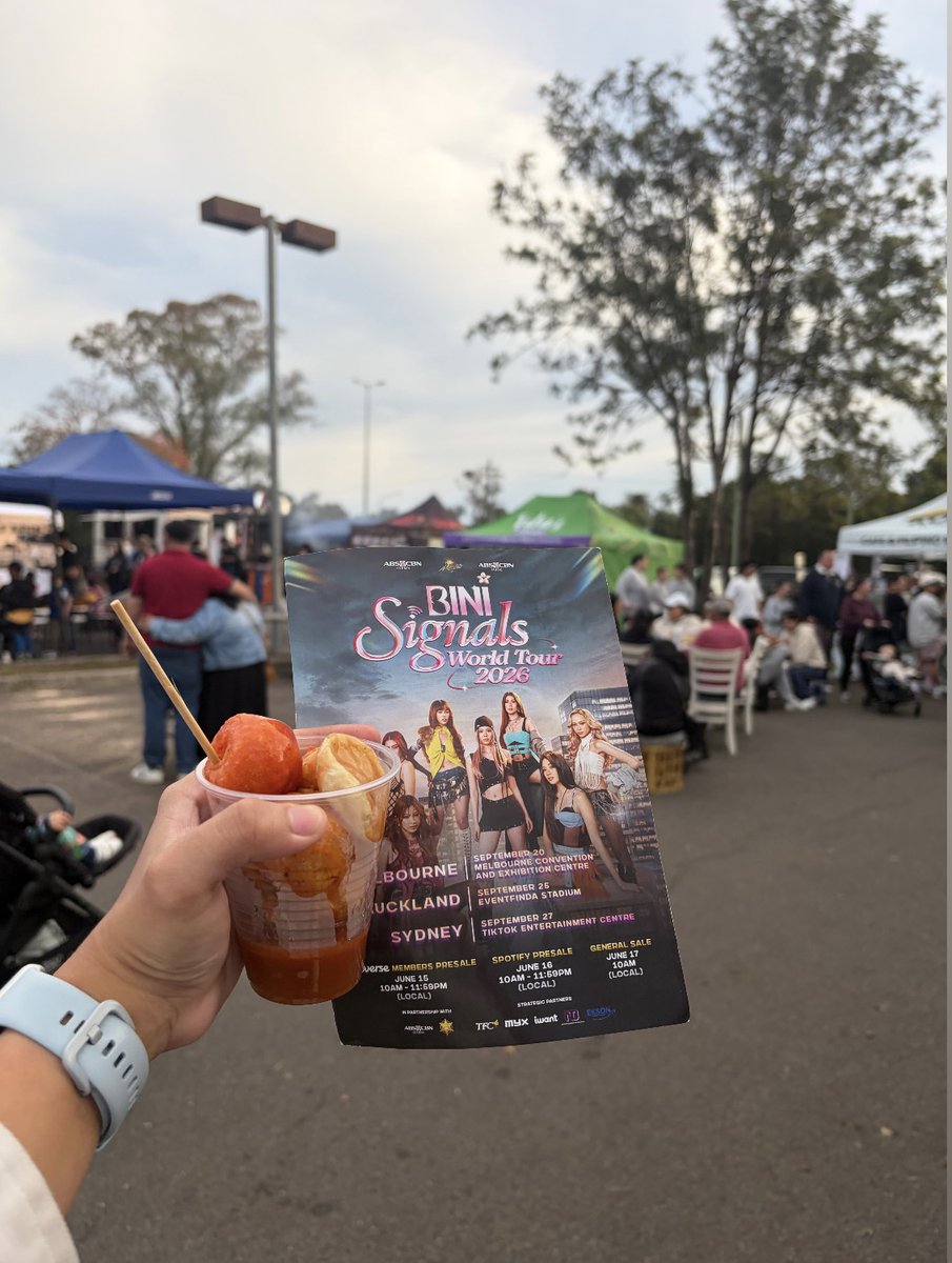 poalofx's tweet photo. 2, 3, mabuhay! 
 
As part of my personal fan support for @BINI_ph #BINI_Signals World Tour here in Sydney, nag-punta po tayo sa dalawang Filipino events today para mamigay ng flyers tungkol sa concert. 

Isa po sa mga pinuntahan natin today ay isang Filipino food festival sa Greater Western Sydney region. 

During the time na andun ako, meron pong singer sa harap, si miss Anja Aguilar. Nung nag-ask po sila ng song request, buong lakas kong sinigaw ang BINI, and because of that binanggit nila ang tungkol sa upcoming BINI concert sa @tiktokentcent without me prompting them, alam niya din talaga. 

Dahil dun binanggit natin na may dala tayong flyers at nag-abot tayo sa kanila ng isa at binasa niya po ang laman nun for all of the event goers to hear, napagkamalan pa tayong promoter, lol. Thank you, miss Anja! 

Pagkatapos po nun kumanta siya ng Salamin Salamin, at ini-announce niya ulit ang tungkol sa concert (watch the first video, cinut ko na para hindi mahaba masyado).

The second video here is a quick pan of what the event grounds looked like and the crowd na meron tayo sa event. Medyo malawak din 'yung space at madami pang hindi nahagip sa video.

May mga binigyan din tayo ng flyers na ibang event goers at mga stalls habang andun po tayo, and some people also approached me to ask for flyers pagkatapos ng kanta ni miss Anja.

May grupo ng mga kabataan sa mismong unahan ng stage na talagang todo sabay at sayaw din sa kanta. Nakakatuwa sila, I asked to take a photo of them but dahil mga kabataan, tatakpan natin ang kanilang mga mukha (see photo).

May mga nakita din tayong nagvi-video at nags-sway habang kumakanta si miss Anja.

Syempre sumupport din po tayo sa mga Filipino owned businesses habang andun tayo at bumili tayo ng mga paninda nila. Cravings satisfied ako sa tusok-tusok!

BINI, when I said isisigaw at ipagkakalat ko kayo dito, I hope you're ready kasi tinutupad ko kung anong sinasabi ko, hahahaha! More updates to come as I continue na maglako dito for you girls.

Sabi ko nga, I'm happy to do these things in silence, but BINI deserves a love so loud everyone can hear, so here we are, hehe.

@bini_aiah @bini_colet @bini_maloi @bini_gwen @bini_stacey @bini_mikha @bini_jhoanna @bini_sheena 

#BINI
#BINI_SIGNALS_TOUR #BINI_SIGNALS_WORLDTOUR_2026
#BINISignalsWorldTour
#BINISignalsWorldTour2026