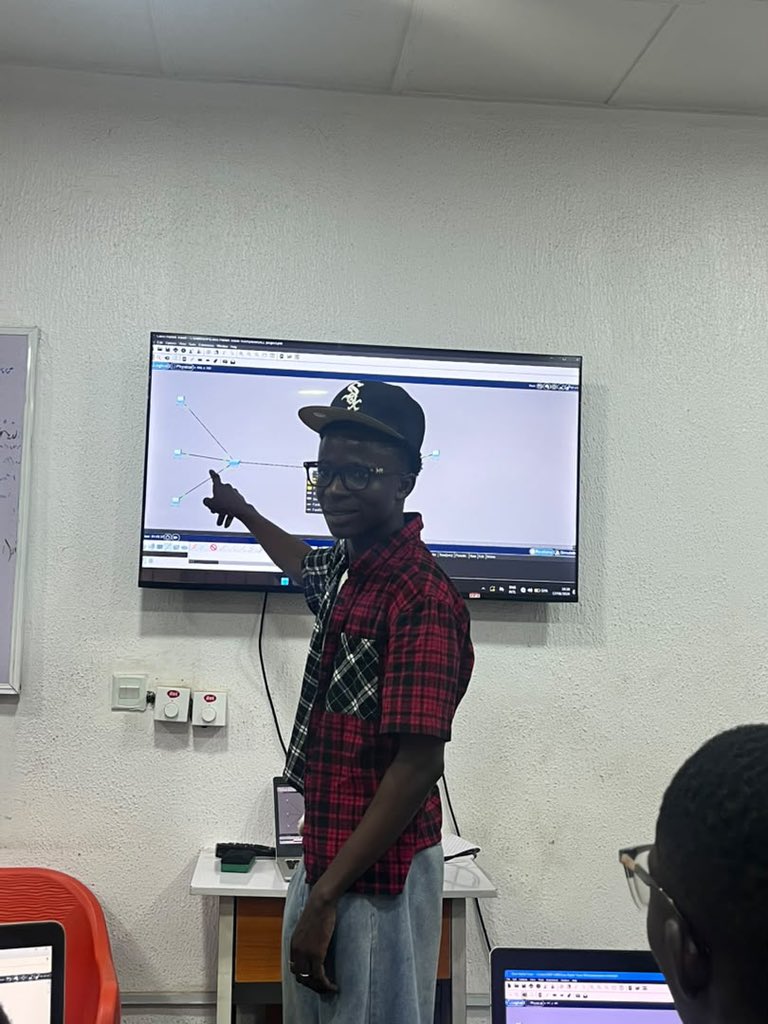THE_CYBRARIANS's tweet photo. #Day3 — Final Session 🔐
@TobiSalawu85708  started cybersecurity just months ago. Today he facilitated a full Packet Tracer lab on Access Control
 Lists. Beginner to facilitator in months.
That is the Cybrarians model. 
Powered by @CiscoNetAcad 
#CyberLabChallenge #TheCybrarians https://t.co/xFexH0rxwT