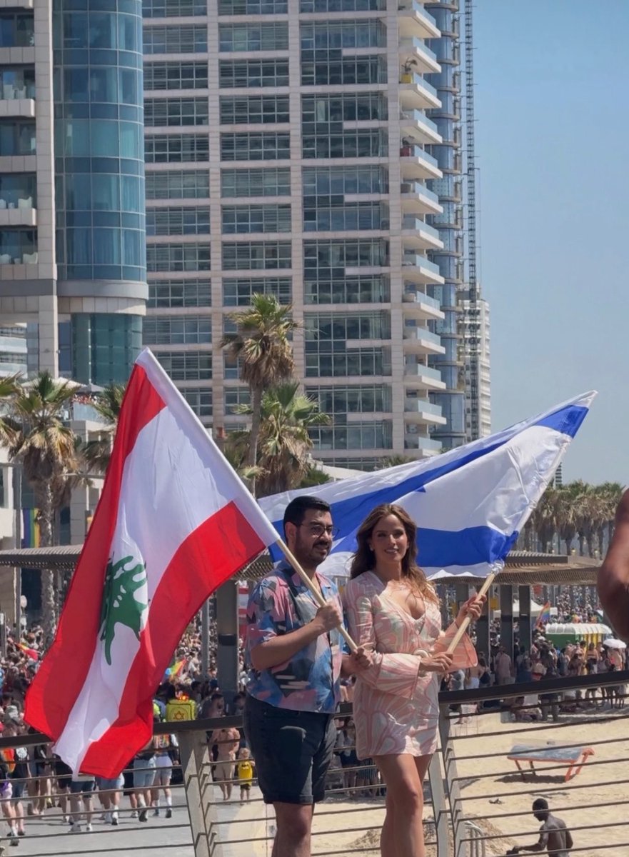 Jonathan_Elk's tweet photo. The craziest thing?

The Lebanese flag flies higher in my hands in Tel Aviv than it does in some parts of Lebanon, where they have the Islamic republic flag or Hezbollah instead.

That’s what happens when a country is taken hostage by people who speak in its name but stopped believing in it long ago.