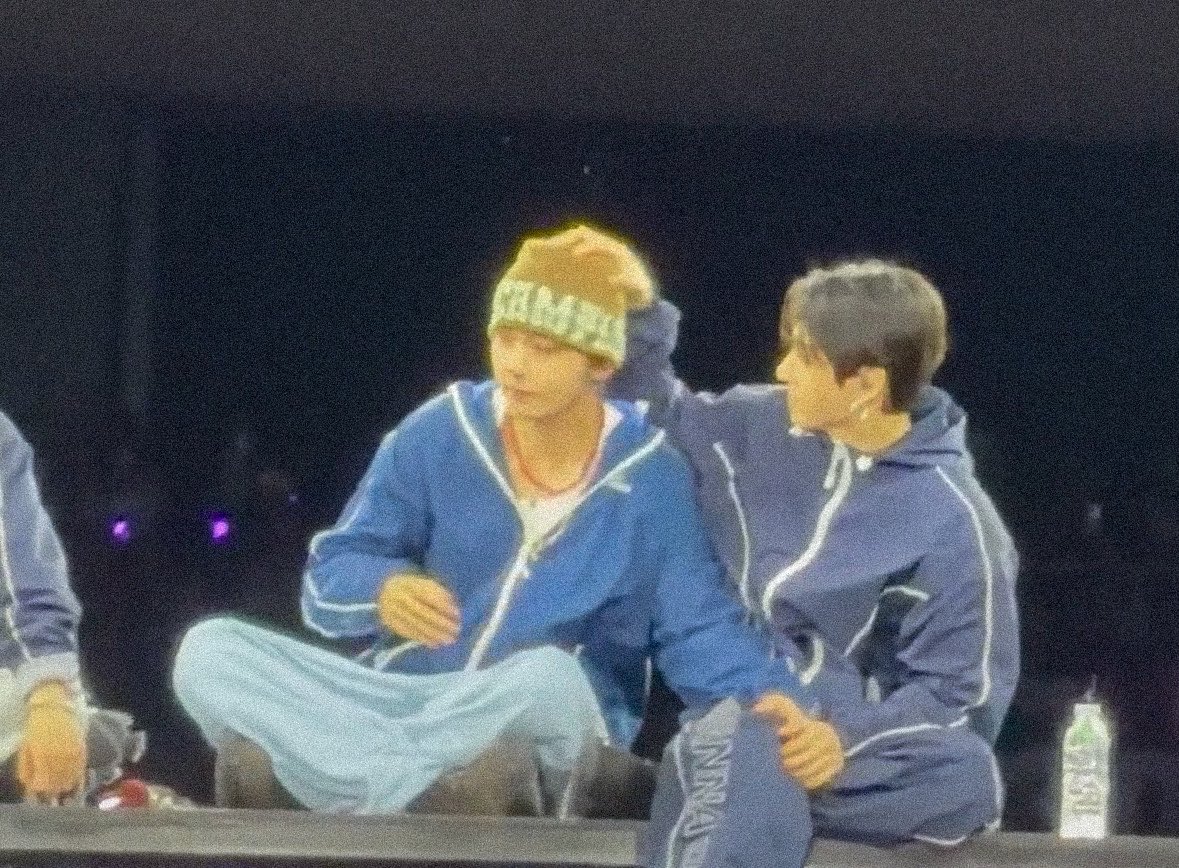 tekooking's tweet photo. the way taehyung’s hand on jungkook’s thigh and jungkook’s hand on taehyung’s head https://t.co/Iz3qKHdGYk