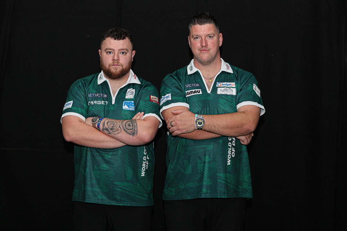 Winmau's tweet photo. Champions return. 🏆

Daryl Gurney and Josh Rock begin the defence of their World Cup of Darts crown today against Belgium. 

SuperChin on the world stage once more. Come on Northern Ireland. 🎯

📸 PDC https://t.co/7jrUOVkrzA