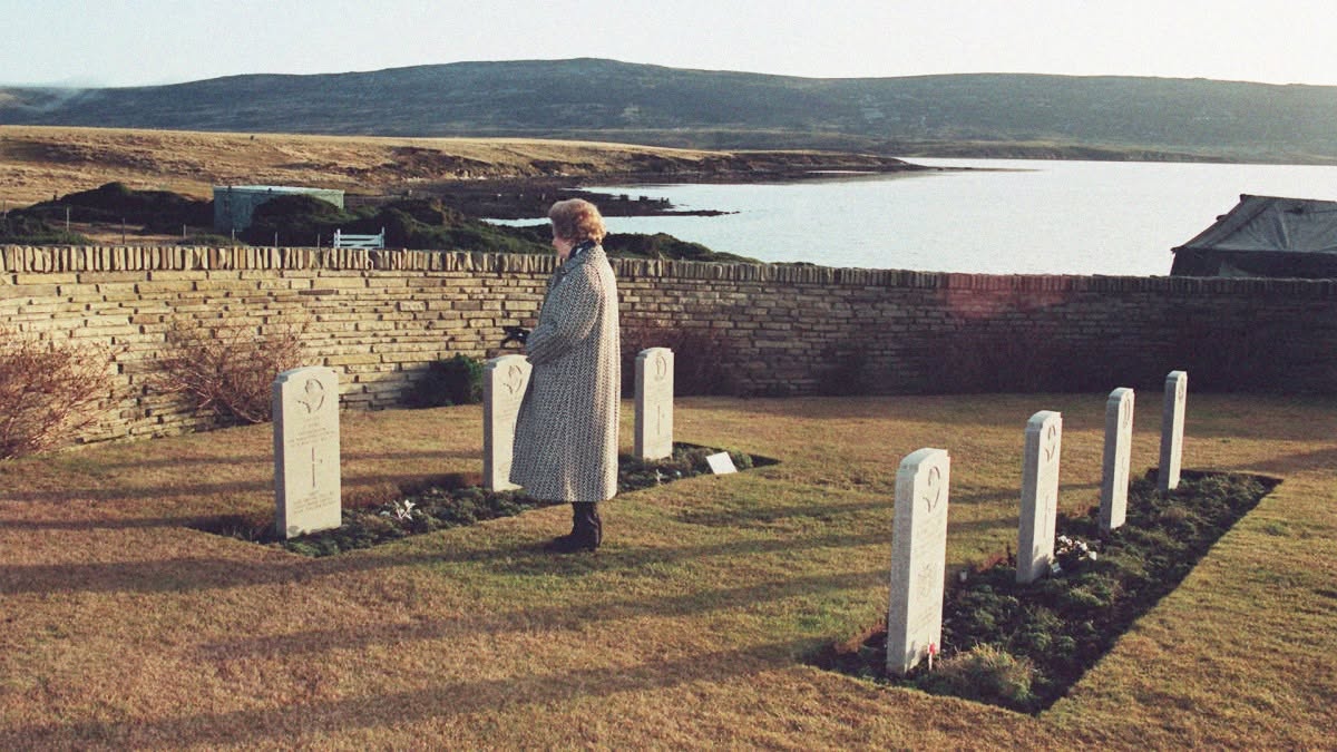 Thatcheritage's tweet photo. Margaret Thatcher at the Blue Beach Military Cemetery at San Carlos in 1992, remembering the servicemen who lost their lives on the grounds where the Falklands invasion started. https://t.co/dUxpjHVQY2