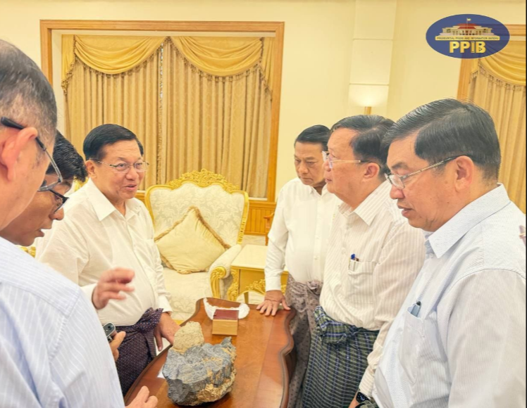 ViewsofMM22's tweet photo. In Nay Pyi Taw (14-6-2026), President U Min Aung Hlaing examined a massive 14,300g (71,500-carat) natural rough sapphire along with a 354.77g sapphire crystal at the Presidential Palace. These rare untreated deep-blue sapphires, found in Mogok in 2020, have now been transferred to the State. #WhatsHappeningInMyanmar
