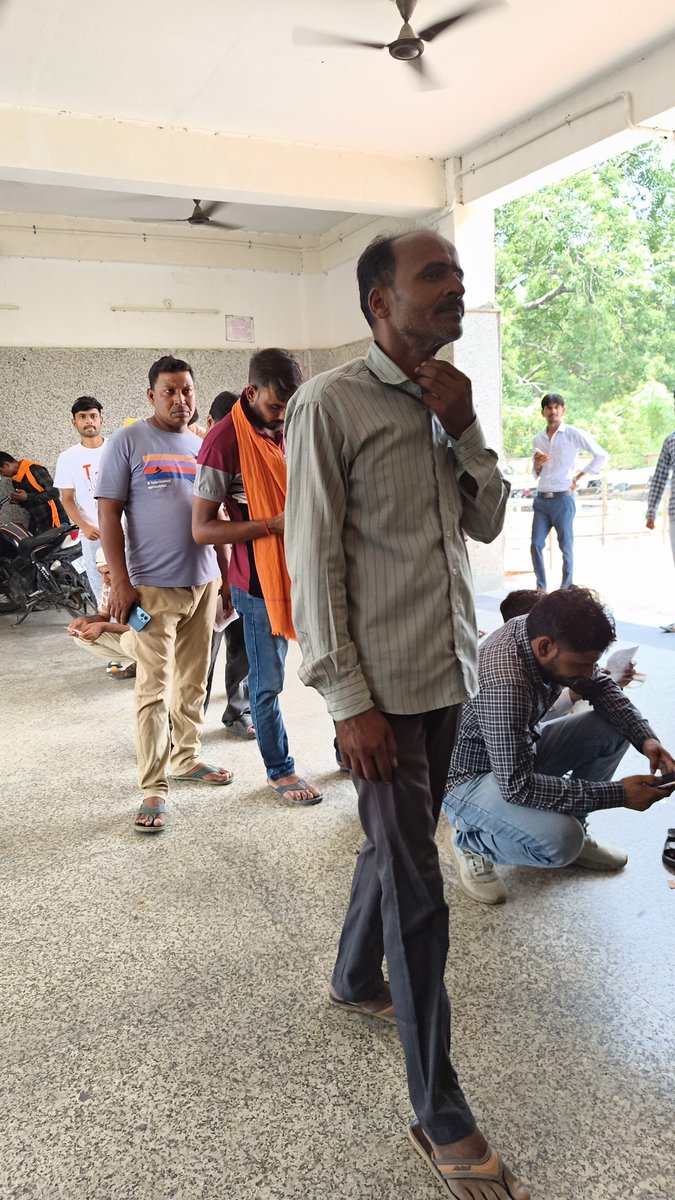 ansariusama218's tweet photo. This is the queue and the guy responsible for giving the ticket is busy on the phone.

@RailwaySeva

And when asked saying server down hai.

@IRCTCofficial  can you confirm.

@RailMinIndia

Goshaiganj, Ayodhya. https://t.co/5qDr0T5NIH