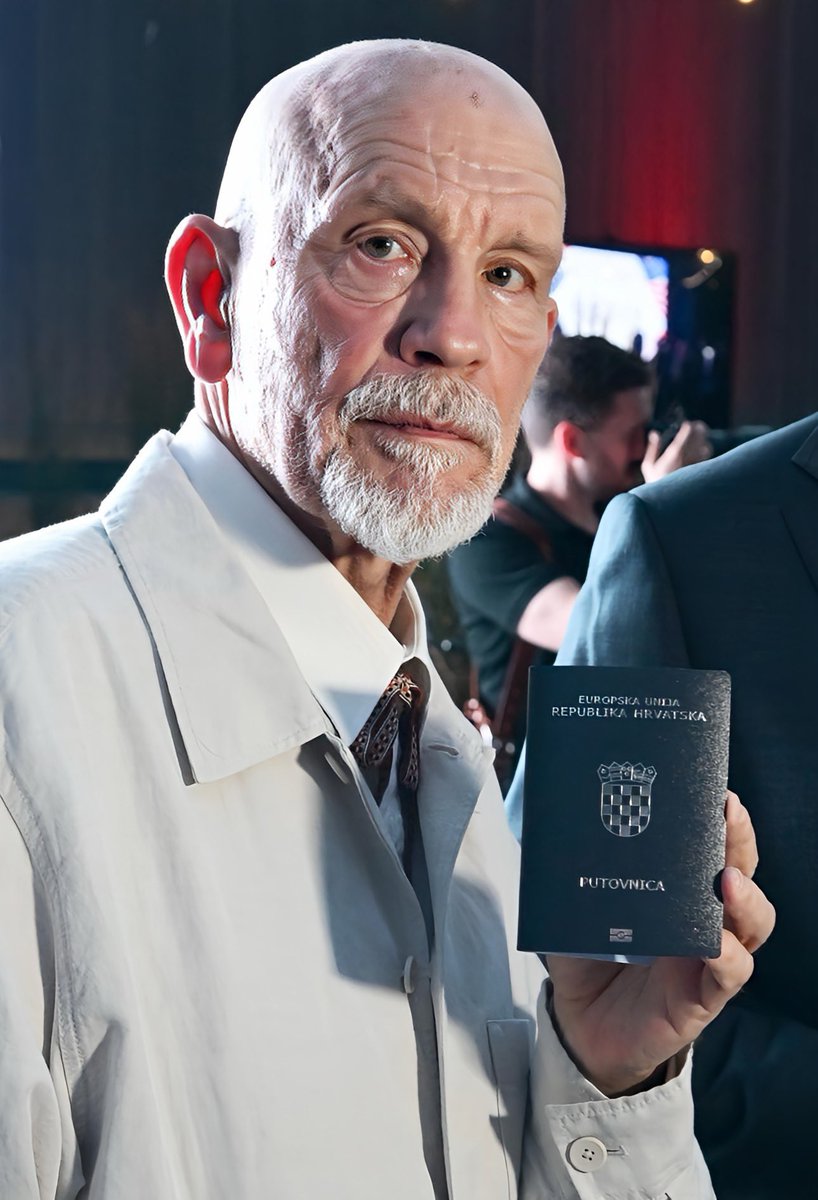 Deana_HR's tweet photo. John Malkovich with his newly issued Croatian passport. https://t.co/mFNckqK3JP