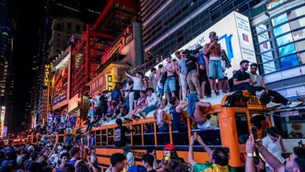 BarryMoore70635's tweet photo. After the Knicks won in New York what damage was done by rioting fans in the streets of Manhattan? 

Use right leaning sources.

GROK says:

After the New York Knicks won their first NBA championship in 53 years (defeating the San Antonio Spurs 94-90 in Game 5 of the Finals on June 13, 2026), celebrations in Manhattan streets—especially around Madison Square Garden and Times Square—turned chaotic. Some fans engaged in destructive behavior, though most celebrated peacefully. 
https://t.co/tRiz44wQwD

Right-leaning sources such as the New York Post and Fox News reported the incidents in detail, describing "out-of-control," "crazed," and "maniac" fans who caused property damage, primarily to vehicles and public infrastructure. 
https://t.co/tRiz44wQwD

Key Damage and Incidents (per NY Post and Fox News)

•NYPD police vehicle smashed: Fans jumped on top of a white NYPD cruiser outside Madison Square Garden and smashed its front windshield. Videos captured two individuals stomping and breaking the glass. 
https://t.co/4LMo6N0ZBH

•School buses and MTA buses damaged/destroyed in Times Square: Rowdy groups climbed onto and overtook multiple orange school buses and an MTA bus after midnight. Instigators ripped the front paneling from the engine compartment of at least one bus, swung the debris around (to crowd approval), and spiked parts onto the street. Fans also dismantled barriers while perched on the buses. 
https://t.co/MAVOAPYlkk
https://t.co/TfJoR86B4r

•Other vehicle damage included fans jumping on and damaging a car on 9th Avenue. Similar patterns (e.g., smashed taxis) occurred in earlier series games. 
https://t.co/tRiz44wQwD

•Fires and smoke: Fans ignited fires in the streets near Bryant Park, producing visible smoke. Fireworks and smoke bombs were also set off in Midtown. 
https://t.co/tRiz44wQwD

•Broader chaos: Extensive traffic blocking, climbing of poles/scaffolding/light poles, and crowds surging through intersections. A teenager was shot in the left foot in Times Square around 2 a.m. amid the mayhem (police recovered a firearm and detained three people of interest; this was not described as targeted fan-on-fan violence but part of the overall disorder). 
https://t.co/TfJoR86B4r

Arrests and Police Response

NYPD deployed officers in riot gear and on horseback. Multiple arrests occurred for assault on a police officer, disorderly conduct, obstructing governmental administration, and petit larceny. Exact totals were pending early reports, but "several" people were taken into custody, with some handcuffed and removed from the scene. One veteran officer told the Post he had never worn riot gear in 20 years on the job until this event. 
https://t.co/tRiz44wQwD

Knicks owner James Dolan urged fans to "celebrate safely." 
https://t.co/tRiz44wQwD

These reports from the New York Post and Fox News emphasize the rapid shift from ecstasy to violence by a disruptive minority, contrasting with smoother celebrations in past championship wins elsewhere. No widespread reports of building looting, major structural damage, or huge monetary estimates emerged—damage centered on vehicles and street-level property. Similar (though sometimes less severe) rowdiness happened after prior games in the series, including after Game 4. 
https://t.co/TfJoR86B4r

Overall, while iconic for Knicks fans ending a 53-year drought, the street scenes included notable vandalism by some revelers.