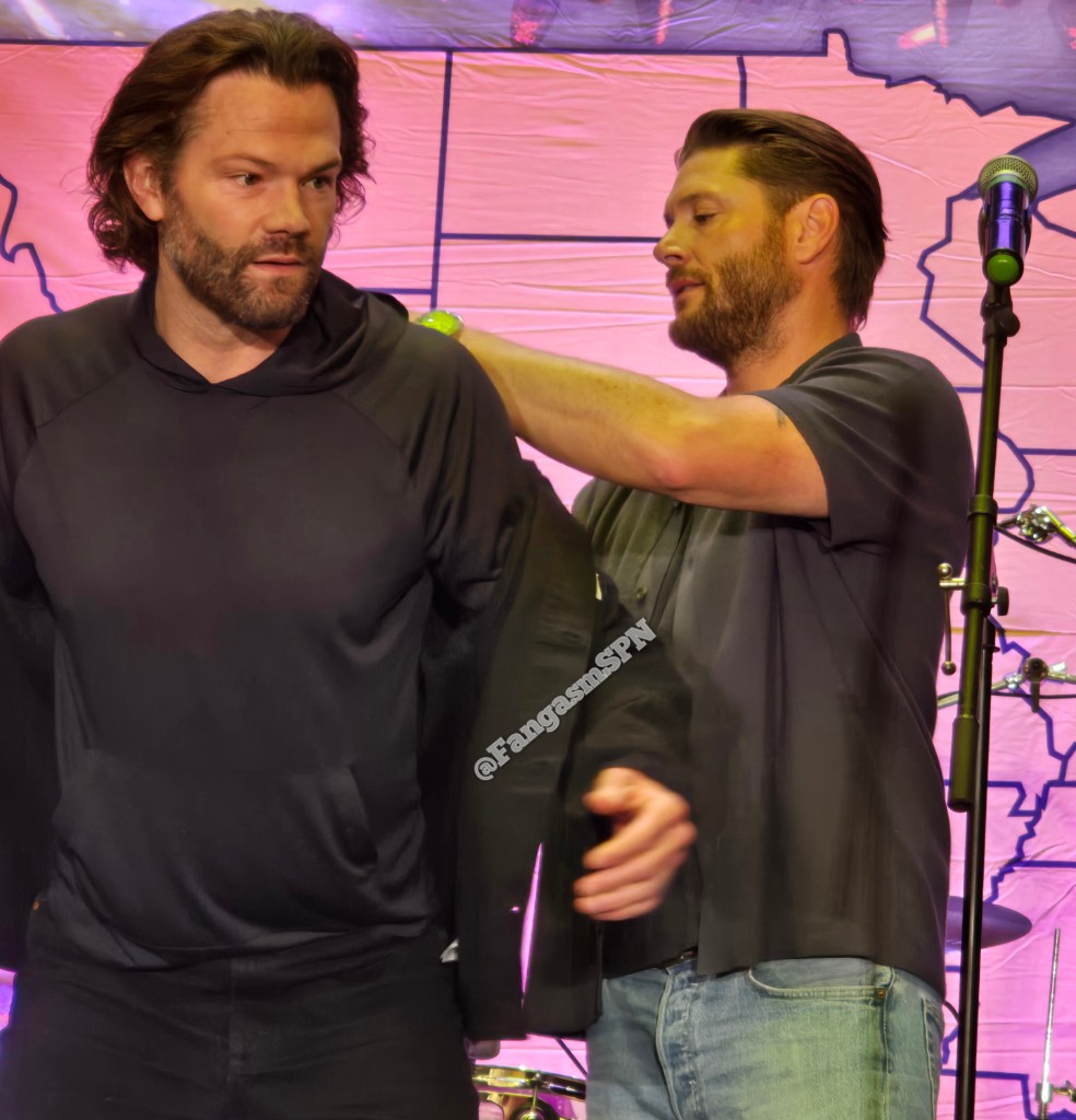 FangasmSPN's tweet photo. Always the big brother.  @JensenAckles removes the tags from @jarpad's jacket ❤️ #SPNFamily #spnbos https://t.co/SMkKreR979