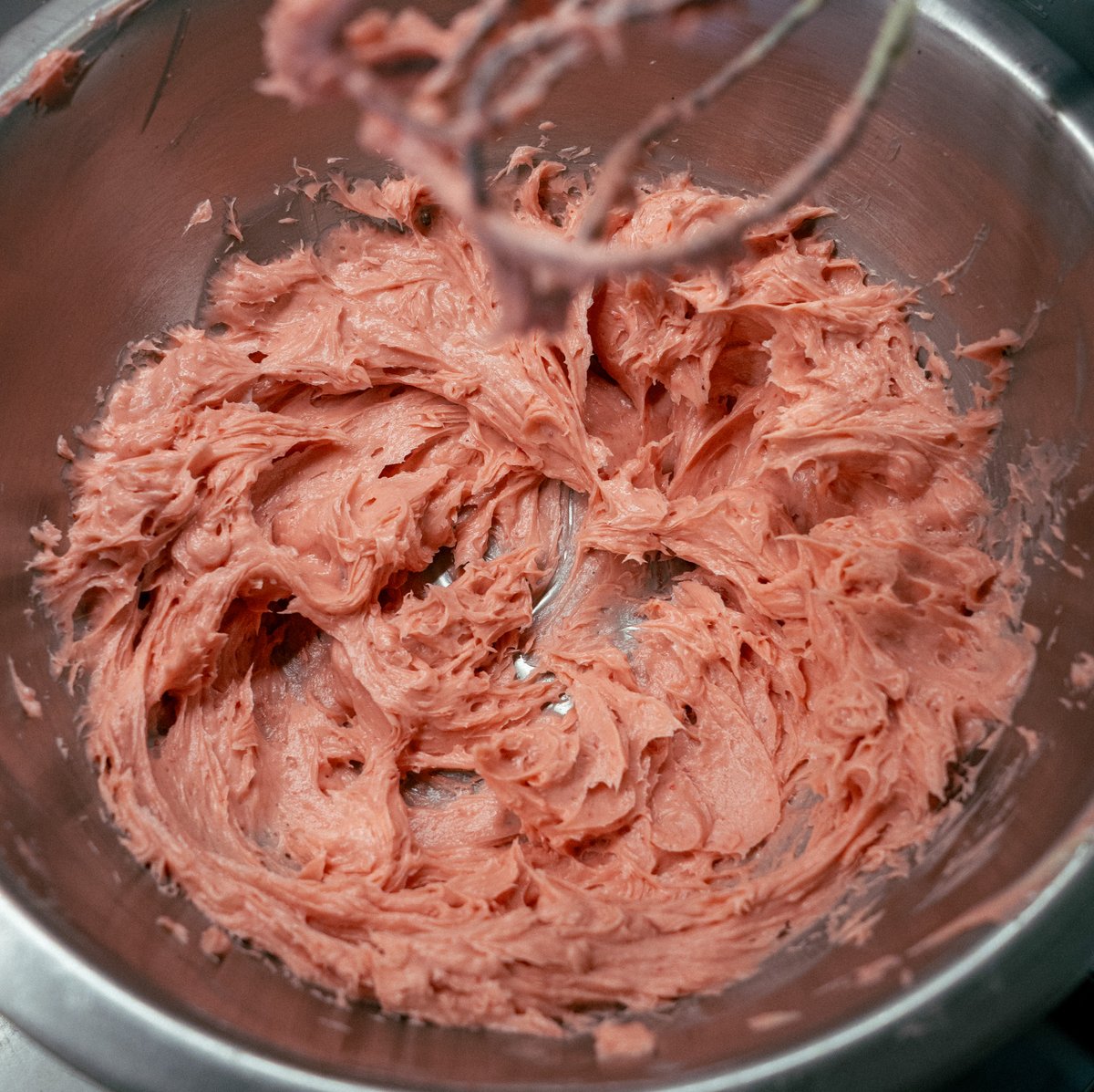 Leon_F_T's tweet photo. It's quite hard to find Raspberry Butter in the grocery store, instead you can easily make your own!

Raspberry Butter Recipe

Ingredients
225 g (1 cup / 2 sticks) unsalted butter, room temperature
100 g frozen or fresh raspberries
2-3 tbsp honey
1-2 tsp lemon juice
1/2 tsp vanilla extract (optional)
Pinch of sea salt (optional)

Directions

Prepare the raspberry compote
Place honey, raspberries and lemon juice in a small pan over medium heat. Bring to a simmer, let raspberries release their juices and collapse. Blend with a hand blender or mash with a fork until smooth. Allow the mixture to thicken, then strain with a sieve to remove seeds. Let it cool to room temperature.

Whip the butter 
Place softened butter in a mixing bowl or a blender. Beat on medium speed for 2-3 minutes until light and fluffy, scraping the sides with a spatula.

Combine
Add the cooled raspberry compote to the whipped butter, with a pinch of sea salt and vanilla if using. Mix on medium speed for 1-2 minutes until fluffy and uniformly pink, scraping the sides with a spatula.

Shape and chill
Spoon the mixture onto a sheet of parchment paper or plastic wrap. Form into a log, roll tightly and refrigerate for 1-2 hours until firm.

Storage 
Keep the log of butter in the fridge for 2-3 weeks, or until original butter's expiry date, and in the freezer for up to 3 months.