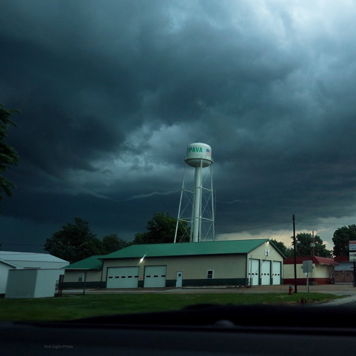 a_dose_of_wx's tweet photo. Funnel behind Ipava water tower after tornado lifted https://t.co/BNSK85t5wC