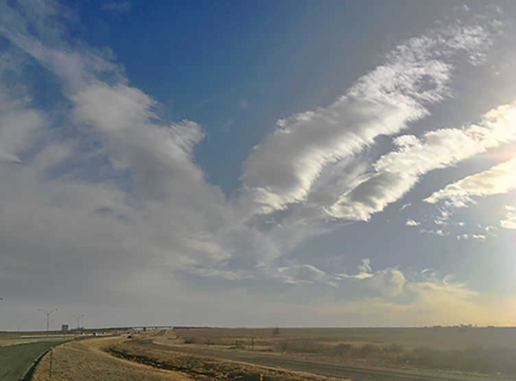 CLARKCGRAVES13's tweet photo. #colorblue West Texas hwy, overpass & crossed clouds, late afternoon https://t.co/QLPwnjCS8D