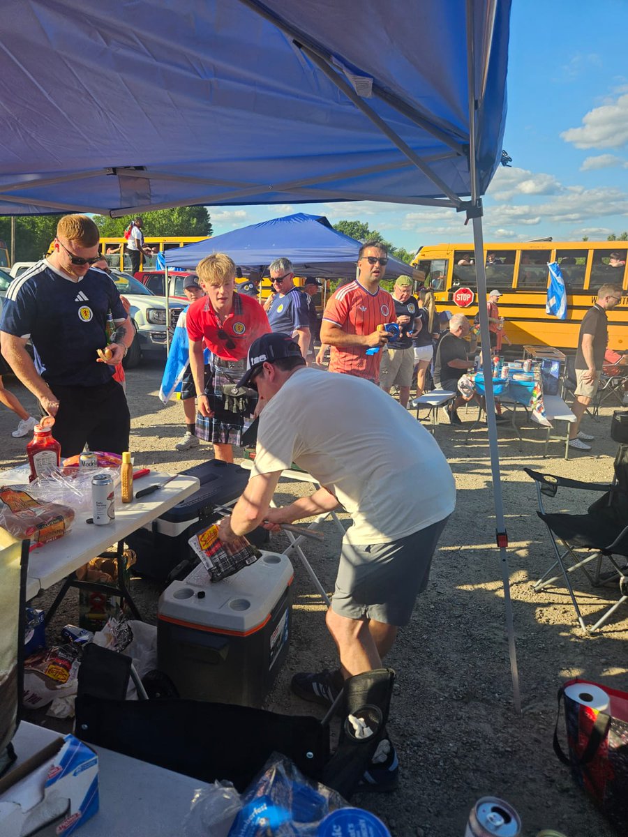 AJmcvy2's tweet photo. This boy set up at station where all the school buses parked for the game. Must have cooked and served 1000 hot dogs. Didn't want a penny. Must have gave out 1000 cold beers as well. Wouldn't accept a penny. 
I believe his name is Brian. Hero

@TartanArmyGroup #scotland #boston https://t.co/6tA2u94IaR