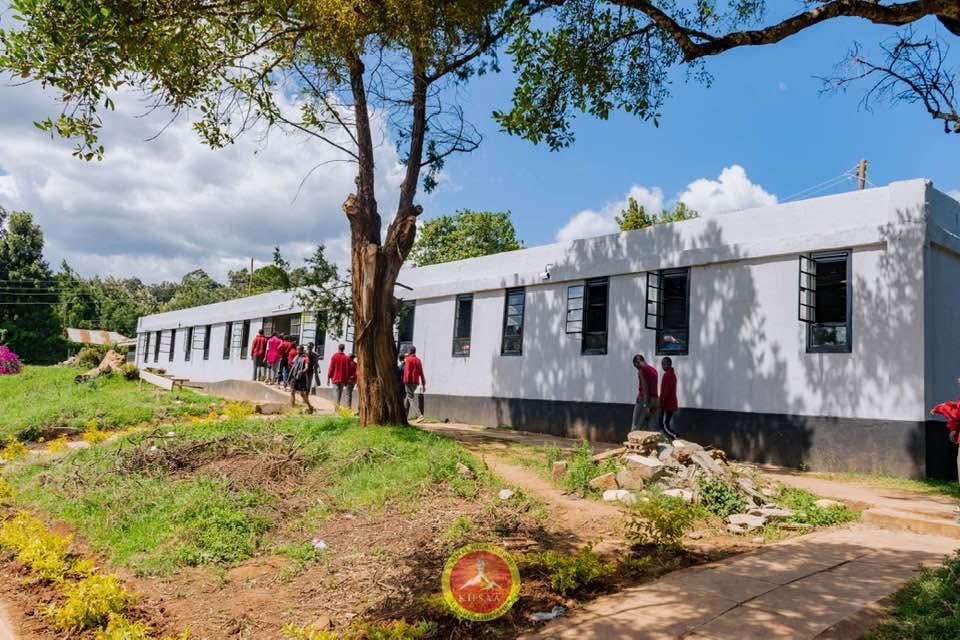 akibaru's tweet photo. Dorm 6 at Kijabe Boys is a precast structure with large windows, multiple exits, and no grills — designed with safety, ventilation, and emergency evacuation in mind.

Ironically, this is the same dormitory that was rebuilt after students burnt down the original Dorm 6 many years ago. As part of a CSR initiative, I was involved in rebuilding it. The sad part is that parents had contributed KSh 5,000 each towards reconstruction, yet no dormitory was built and the funds disappeared. Students eventually nicknamed the project “Prado” after allegations that the culprit acquired a new vehicle while the dorm remained unbuilt.

Back in the 1990s and early 2000s, the culture of burning school property was almost unheard of. Yet over the years, incidents of students destroying their own schools became more common. Looking closely at many of these cases, one pattern stood out.

Students would burn dormitories and classrooms, but they would never burn the school bus.

Why?

Because they had a sense of attachment and ownership. The bus took them to functions, sports events, and educational trips. They interacted with it regularly and saw it as part of their experience. They valued it.

That realization prompted Kijabe Boys alumni to regroup and return to support their former school. We learned that many public institutions lack a true sense of ownership. Teachers, Boards of Management, and administrators often serve for limited periods, but alumni remain connected to the institution for life.

We therefore pushed for stronger alumni involvement in school leadership and development because former students understand the culture, history, and long-term needs of the school better than anyone else. More importantly, current students can easily relate to someone who once sat in the same classroom and slept in the same dormitory.

Nearly five years later, the results speak for themselves.

The alumni have not only provided leadership but have also invested heavily in the school. They have funded off-grid energy projects, water initiatives, student sponsorships, and other developments that directly improve student welfare.

Most importantly, today’s students understand that many of these projects are being financed by former students who genuinely care about their future. Through mentorship and regular engagement, they have developed a stronger sense of belonging and responsibility.

When students feel ownership, they stop seeing school property as something to destroy and start seeing it as something worth protecting.

Currently the boys went home last week with the current wave mostly because of world cup but no damage was done ✅