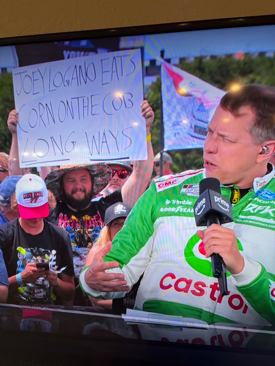 OSteve007's tweet photo. @nascar @PoconoRaceway #prime_video  Live 1/2 hour ago, while interviewing @keselowski one of @joeylogano fans had a sign about eating habits.- #lmao https://t.co/i9Fb6aWEiG