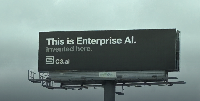 mernit's tweet photo. The AI billboards on the 101 are all so boring.  

It feels like all of them were invented during a HR-supervised corporate brainstorming session.

There's no creativity, no spark.

Why are they all so soulless? https://t.co/te9kyOkJUt