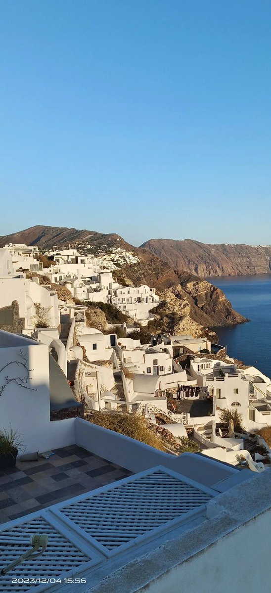 emits2005's tweet photo. Just spent a perfect sunset hour at Santorini’s Oia village—white buildings against golden skies, local wine with a view, and zero rush. This is how slow travel feels like magic.  #TravelDiaries #SantoriniMoments https://t.co/o0S4Ap5wEa
