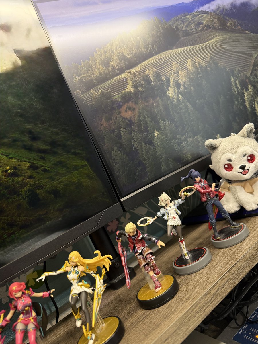 manamikiyota's tweet photo. My work desk is getting pretty lively. Koromaru recently joined the party. 🐾 https://t.co/9Mp15V4Rk9