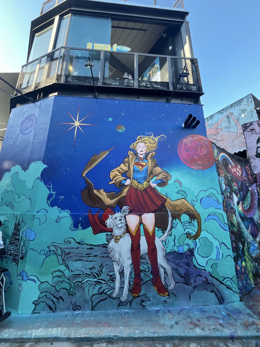 DCUBrief's tweet photo. A “SUPERGIRL” mural of Bilquis Evely’s artwork in Batman Alley, Brazil. https://t.co/AOUIM1lz7f