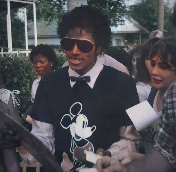 emocnzz's tweet photo. michael and his mickey mouse shirt against the world https://t.co/BlS9vH441G