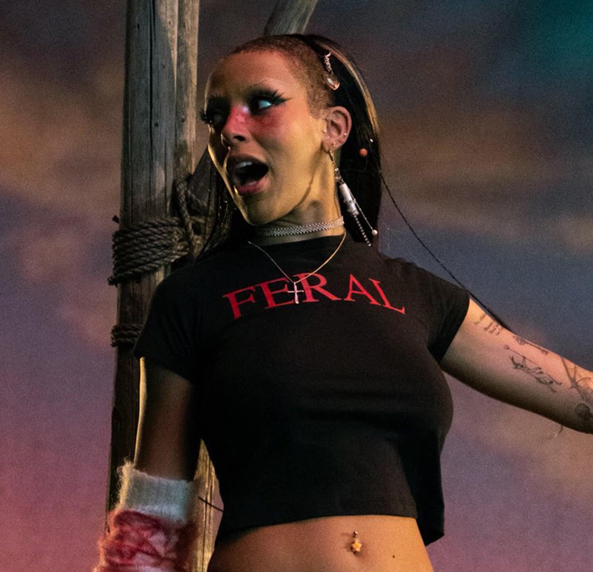 DojaPortal's tweet photo. @PopBase @riconasty @NYCPride That ‘FERAL’ Tshirt from PTTR m/v, oh impactja 😭 https://t.co/XXmKqh3CDM