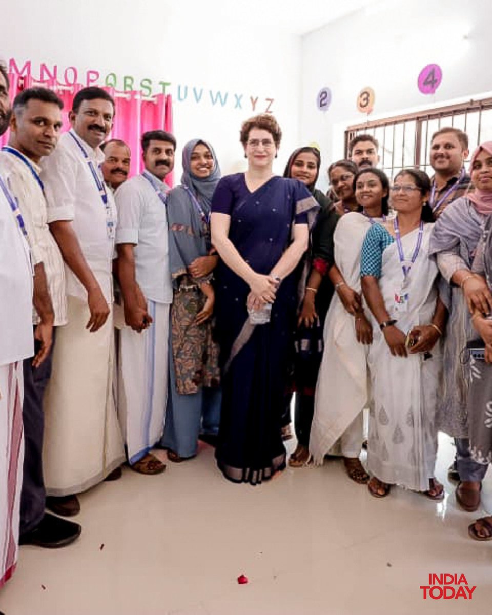 IndiaToday's tweet photo. #InPics | Priyanka Gandhi, Congress General Secretary and MP from Wayanad, inaugurated a Smart Anganwadi at Odamoottil. She also interacted with children and posed for group photographs during the event.

#IndiaTodaySocial #Wayanad #PriyankaGandhi #SmartAnganwadi #KeralaNews https://t.co/2PYgdNpEXp