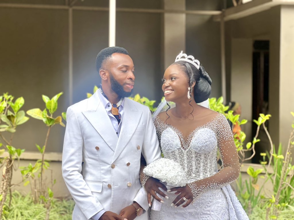 powerfmuganda's tweet photo. Family join us in celebrating the newest couple in town. Congratulations to the “Flames” 😂😂😂
Mr. &amp; Mrs Bwambale. 🤵🏽‍♂️👰🏽
#AllAboutLove https://t.co/Z6G2ukoeAv