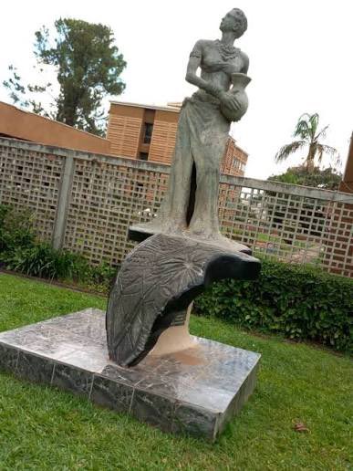 56Tribe's tweet photo. Africa Hall has a sculpture of an African lady representing an Africa Hall girl. “Walk in the light” we brought home the #AfroStone Solidarity.

The hall is the second female students’ residence at Makerere.

One of the popular hall traditions is the Afro-Stone Solidarity that dates back to 1974. 

History has it that Livingstone Hall, a neighbouring male students’ residence took on the responsibility of protecting Africa Hall ladies after their previous Nkrumah Hall associates decided to merge with Northcote Hall (now called Nsibirwa Hall) to form the Northcote Resistance Army in 1972.

#tribe56