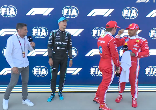 leclercsletters's tweet photo. trying to interview charles but hes busy yapping with lewis https://t.co/VzAIF8lpWH