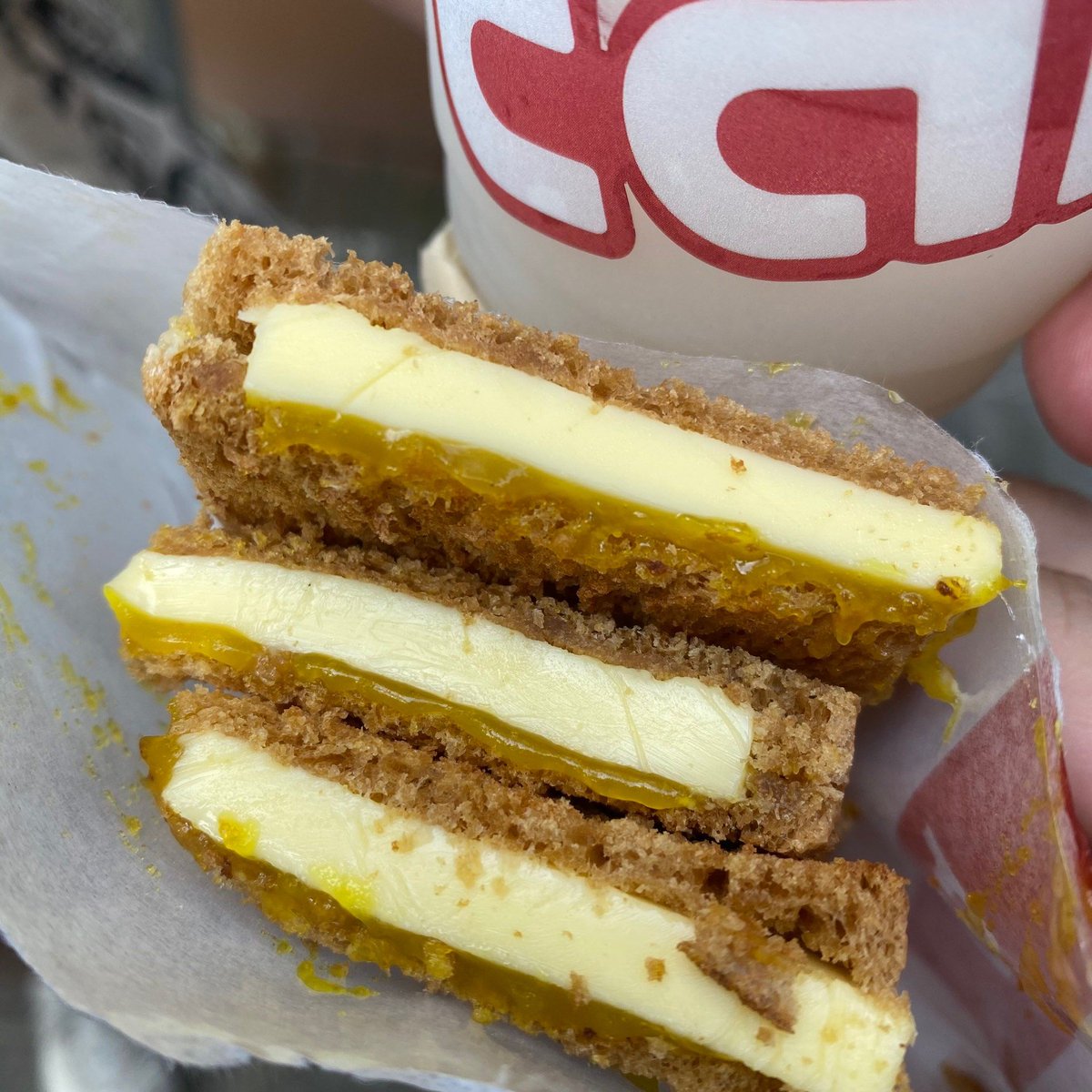 zed213243d's tweet photo. Just got woken up by my partner making toast, and now they’re standing by the window grinning at me holding two sticky buttered slices—today’s already 10/10 https://t.co/isMhM1AhwD