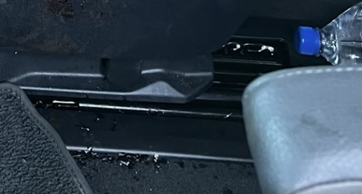 JustinWeRchange's tweet photo. At this point it should be clear that Charlie Kirk was killed by an exploding mic under his shirt.

I doubted it at first but the upward shirt movement before the neck impact &amp; the tiny chards of glass all over the SUV are the smoking gun.

@TPUSA &amp; @WhiteHouse are complicit. https://t.co/aZc6R5h4n8