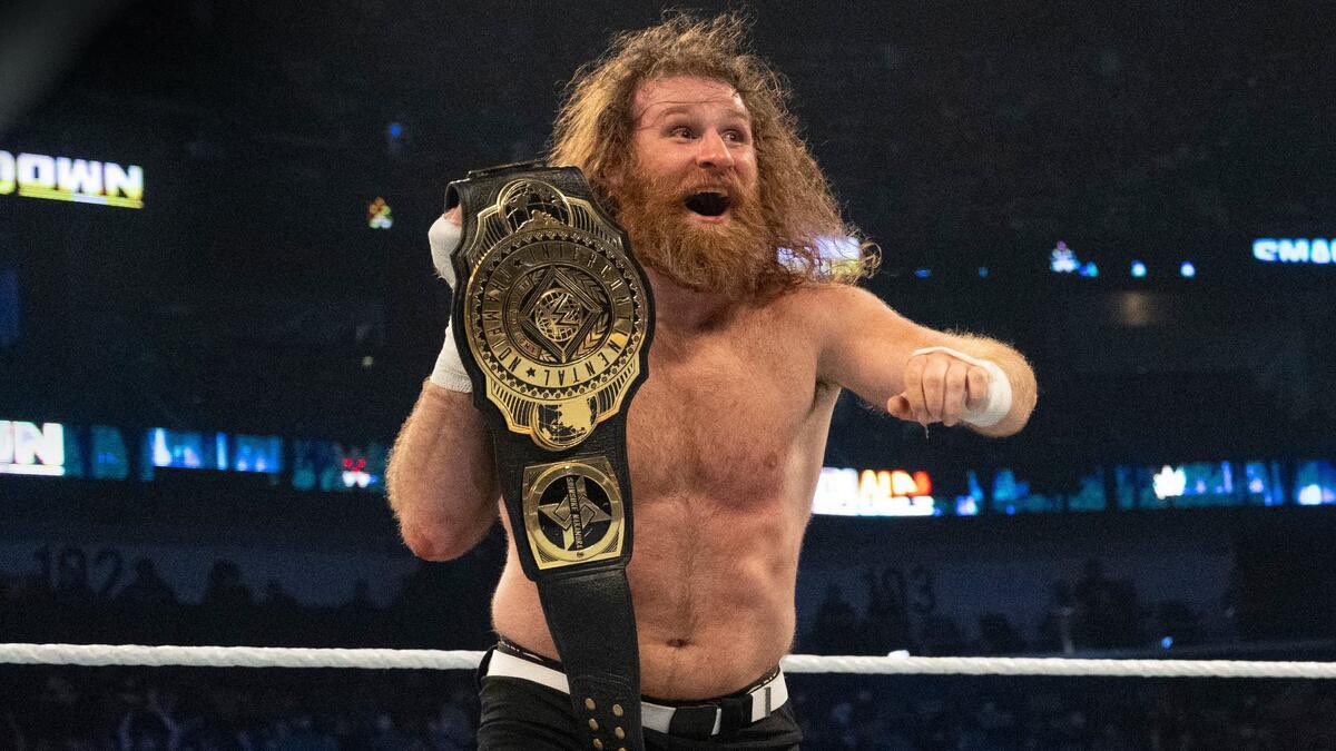 WrestleOps's tweet photo. Sami Zayn is now officially a Grand Slam Champion. https://t.co/CryXZSLYtY