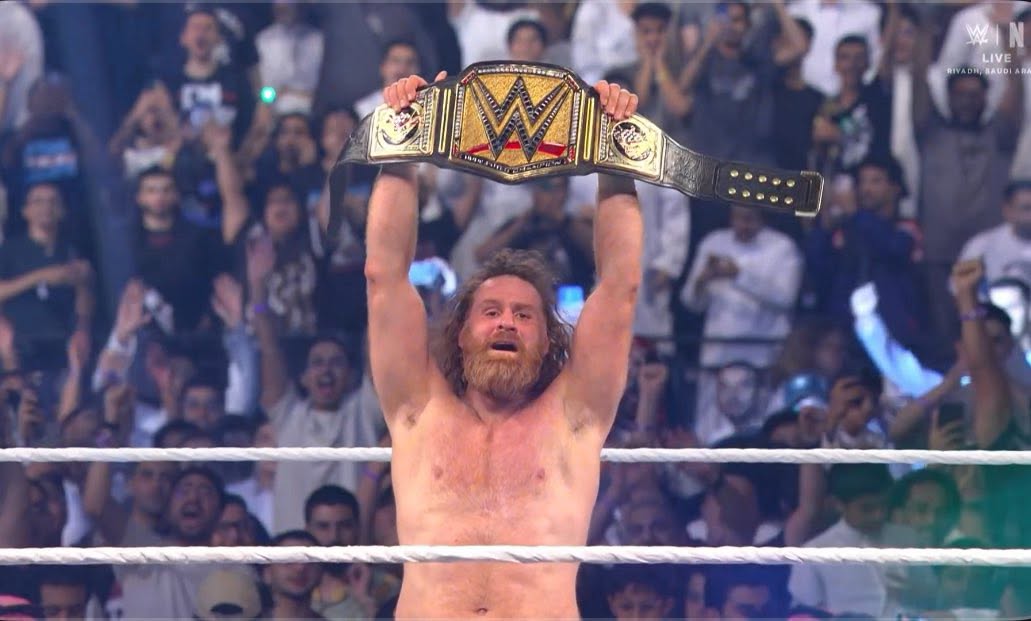 Fightful's tweet photo. Sami Zayn is now a WWE Grand Slam Champion! 

- WWE Champion
- IC Champion
- US Champion
- Tag Team Champion https://t.co/eqiCYs0MI3