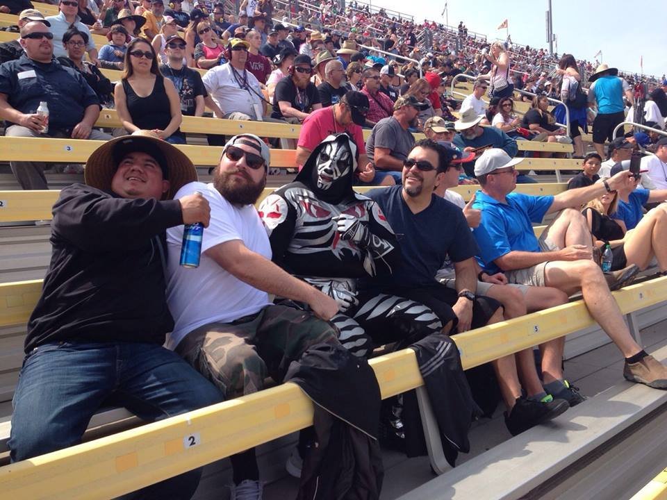 allan_cheapshot's tweet photo. La Parka at a NASCAR race in full gear. https://t.co/CoL3y9EkzK